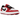 Jordan 1 Low Golf Spiked Varsity Red White Black sneakers i vinkelret visning med rød og hvid læderoverdel samt sorte detaljer